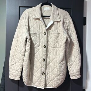 Taupe/nude quilted jacket.